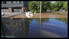 The Locks development -- Flooded car blocking the entrance.