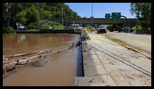 Wissahickon Creek and Ridge Ave (Wissahickon Transfer) -- Debris damaged the railing which is being repaired.