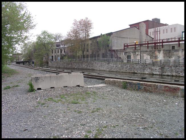 Back/corner from across the canal